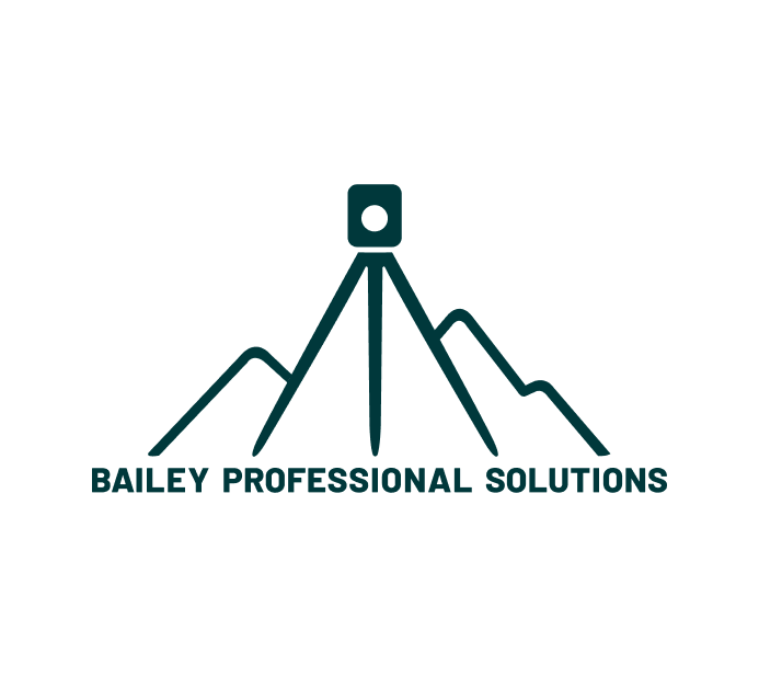 The image showcases a logo for Bailey Professional Solutions. The logo features a stylized mountain range with a surveying instrument (theodolite) positioned at the peak. The company name is displayed in clean, modern typography below the mountain graphic, emphasizing its professional services. The overall design represents precision and expertise, likely reflecting the company's work in surveying or geospatial solutions.