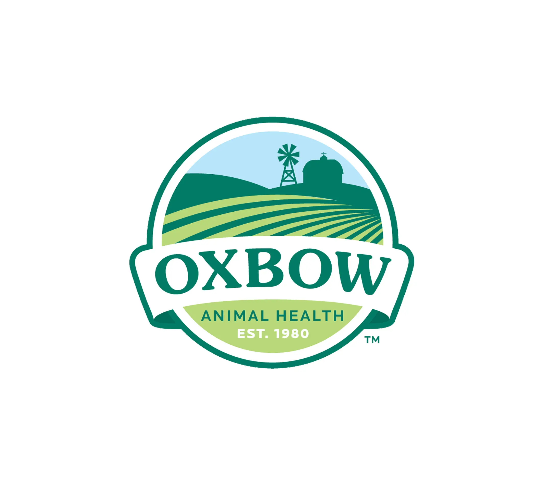 The image displays the logo for Oxbow Animal Health. The logo features a green and blue color scheme, showcasing a rolling field with a windmill and barn in the background. The company name "OXBOW" is prominently displayed in bold green letters, with "ANIMAL HEALTH" and "EST. 1980" beneath it, in smaller text. The design evokes a sense of farm life and care for animals, reflecting the company's focus on providing high-quality nutrition for pets.